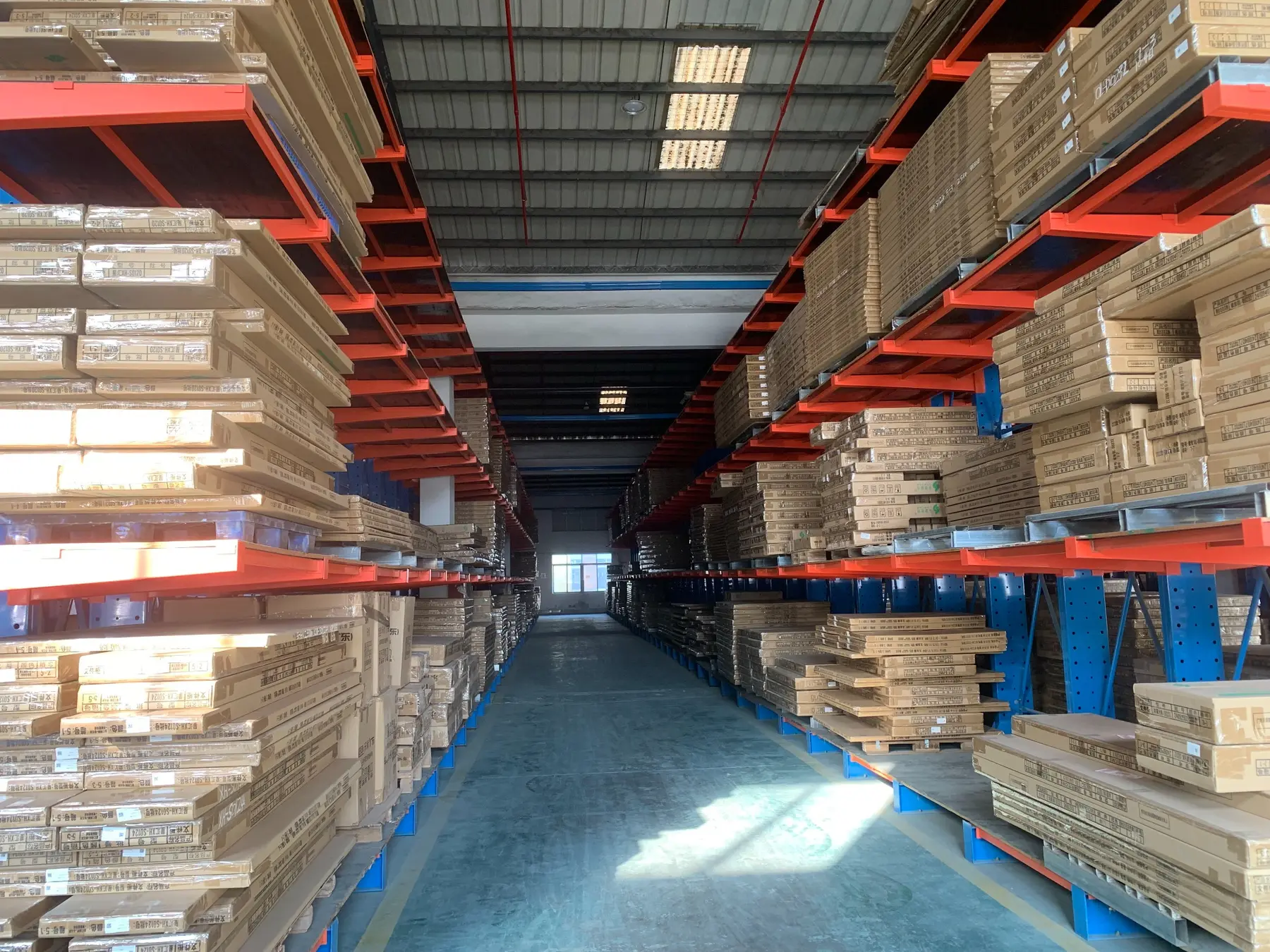 Organized packaged office furniture inventory at HUANGSI warehouse