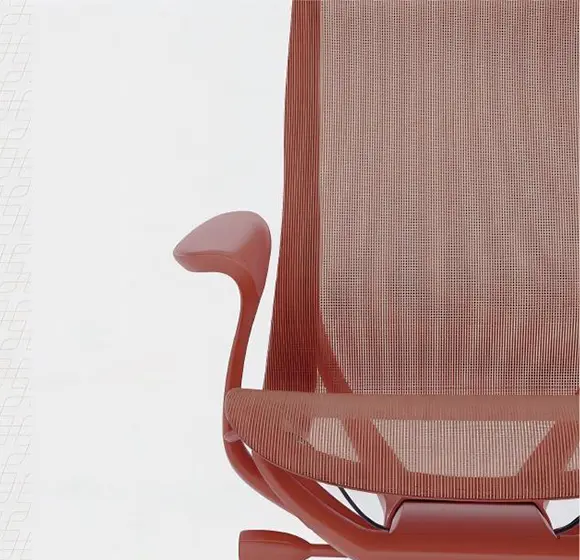 Close-up of Canyon Red mesh back, armrest and sculptural lower frame